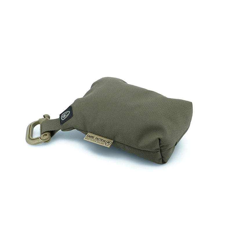 A ranger green Sabre Tactical Micro Shooting Bag with a ITW Grimloc snap open clip for securing when moving to your shooting location.